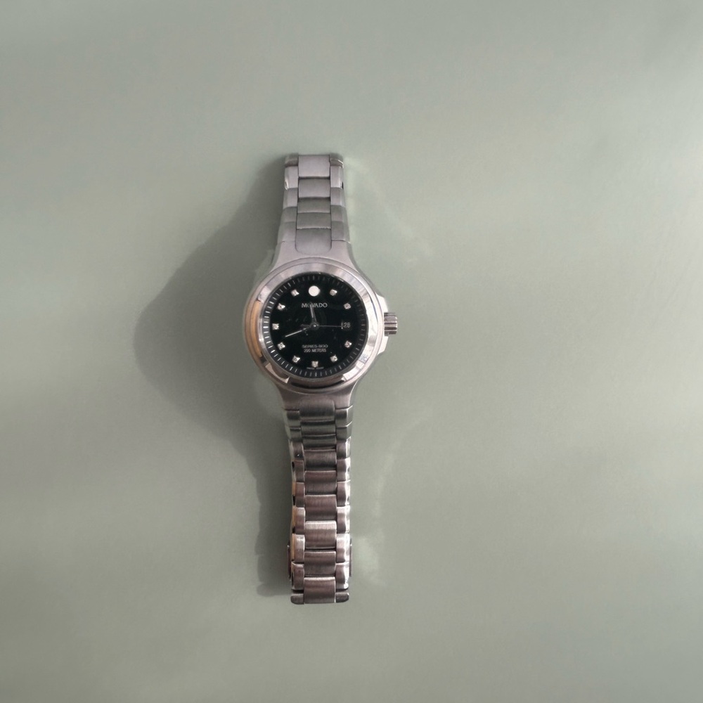 Movado Silver Bracelet Watch with Black Dial